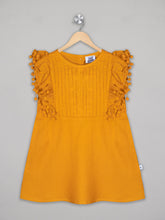 Load image into Gallery viewer, Solid yellow knee length dress for girls with pom pom detailing
