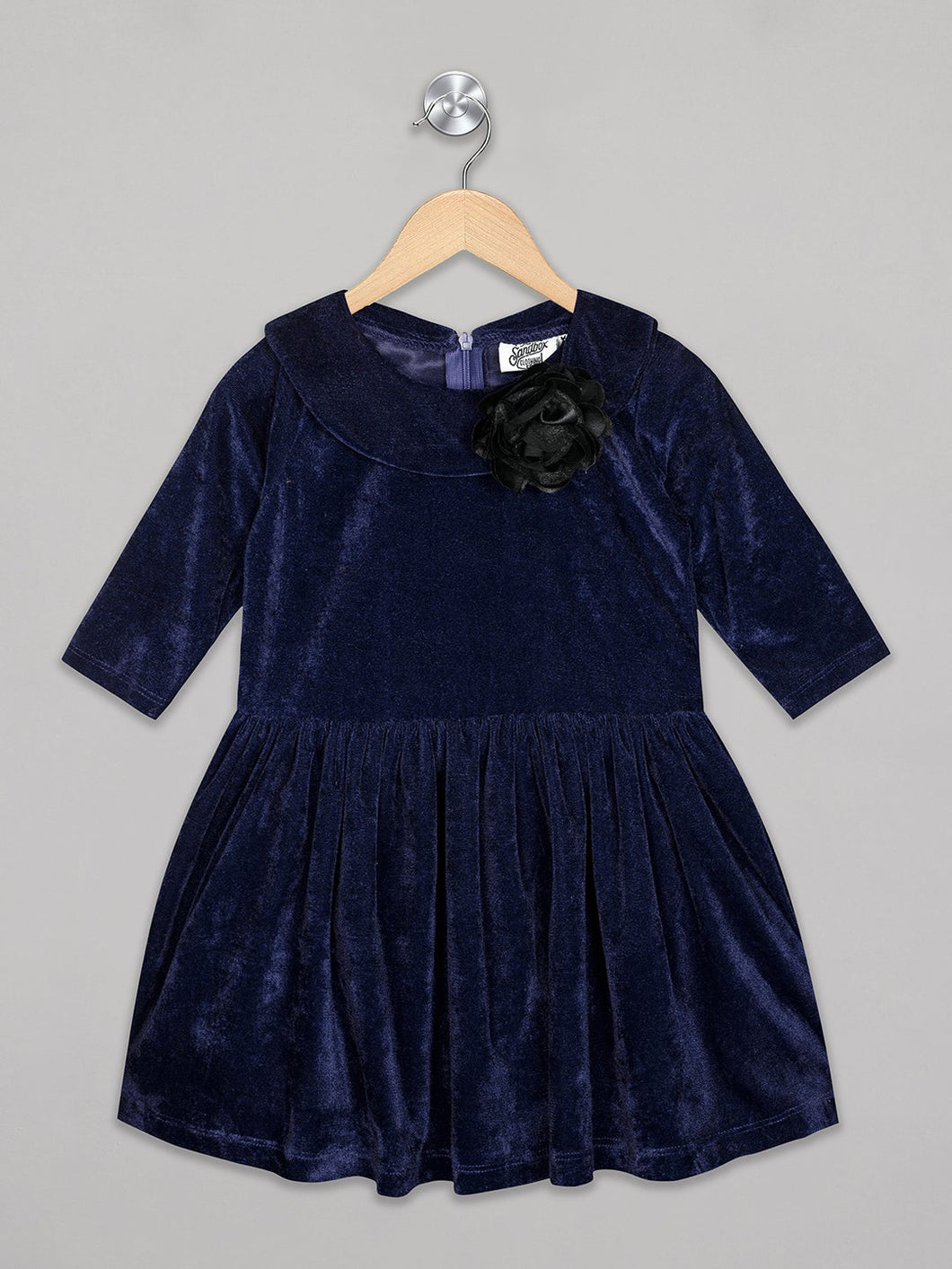 Navy velvet knee length frock for girls with flower attachment